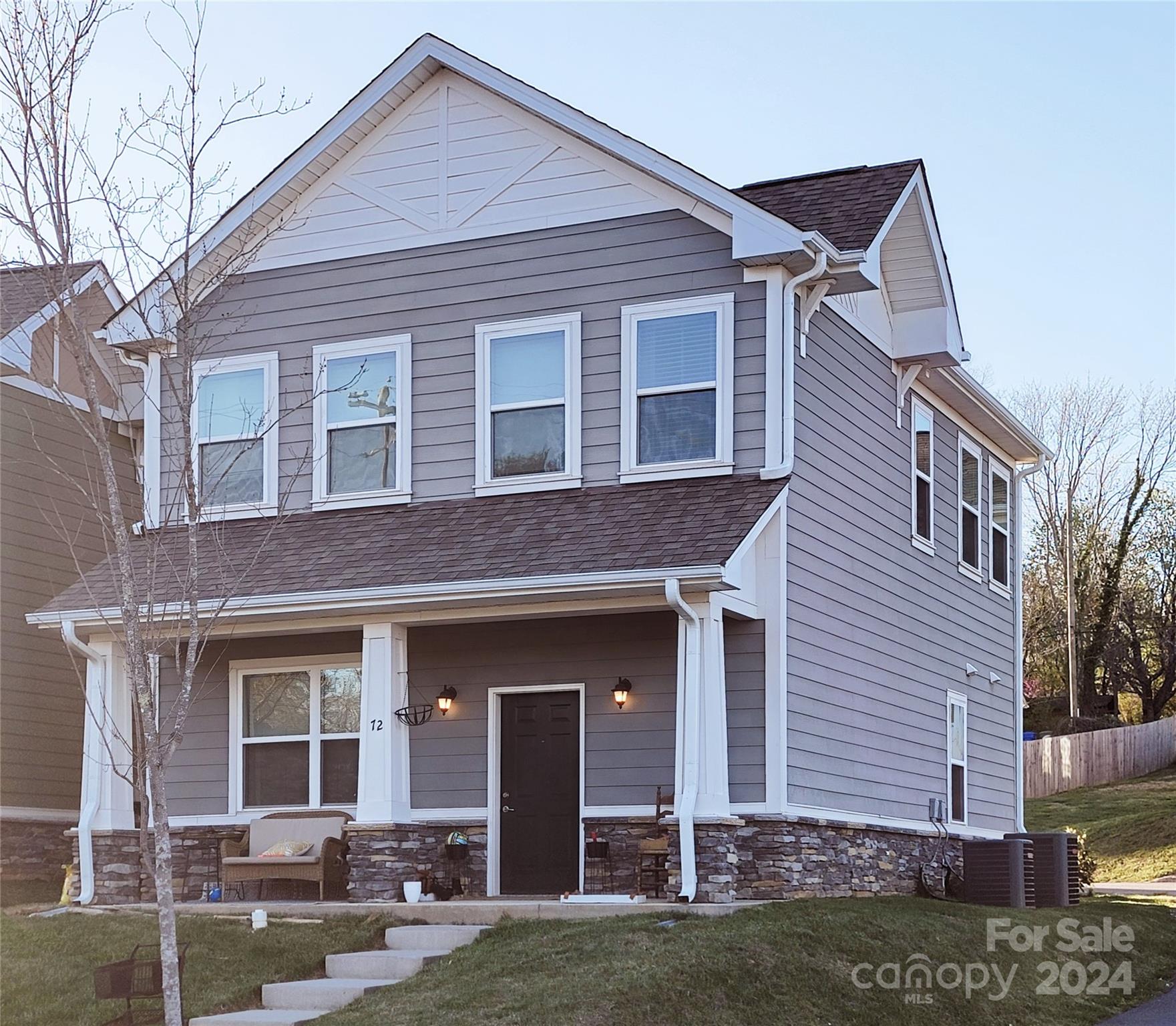 72 Shiloh Road Asheville, NC 28803 - Photo 15 of 15 a front view of a house with a garden