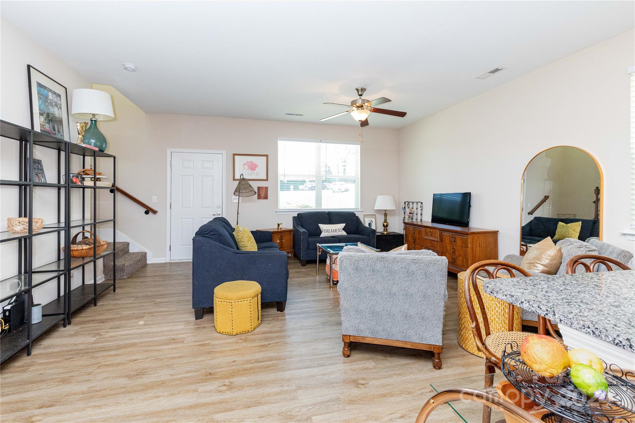 72 Shiloh Road Asheville, NC 28803 - Photo 4 of 15 a living room with furniture flowerpot and wooden floor