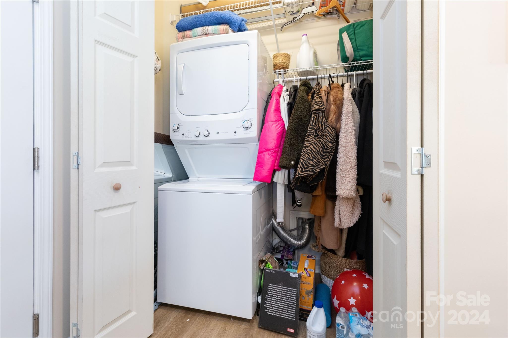 72 Shiloh Road Asheville, NC 28803 - Photo 7 of 15 a view of walk in closet with clothes and shoes