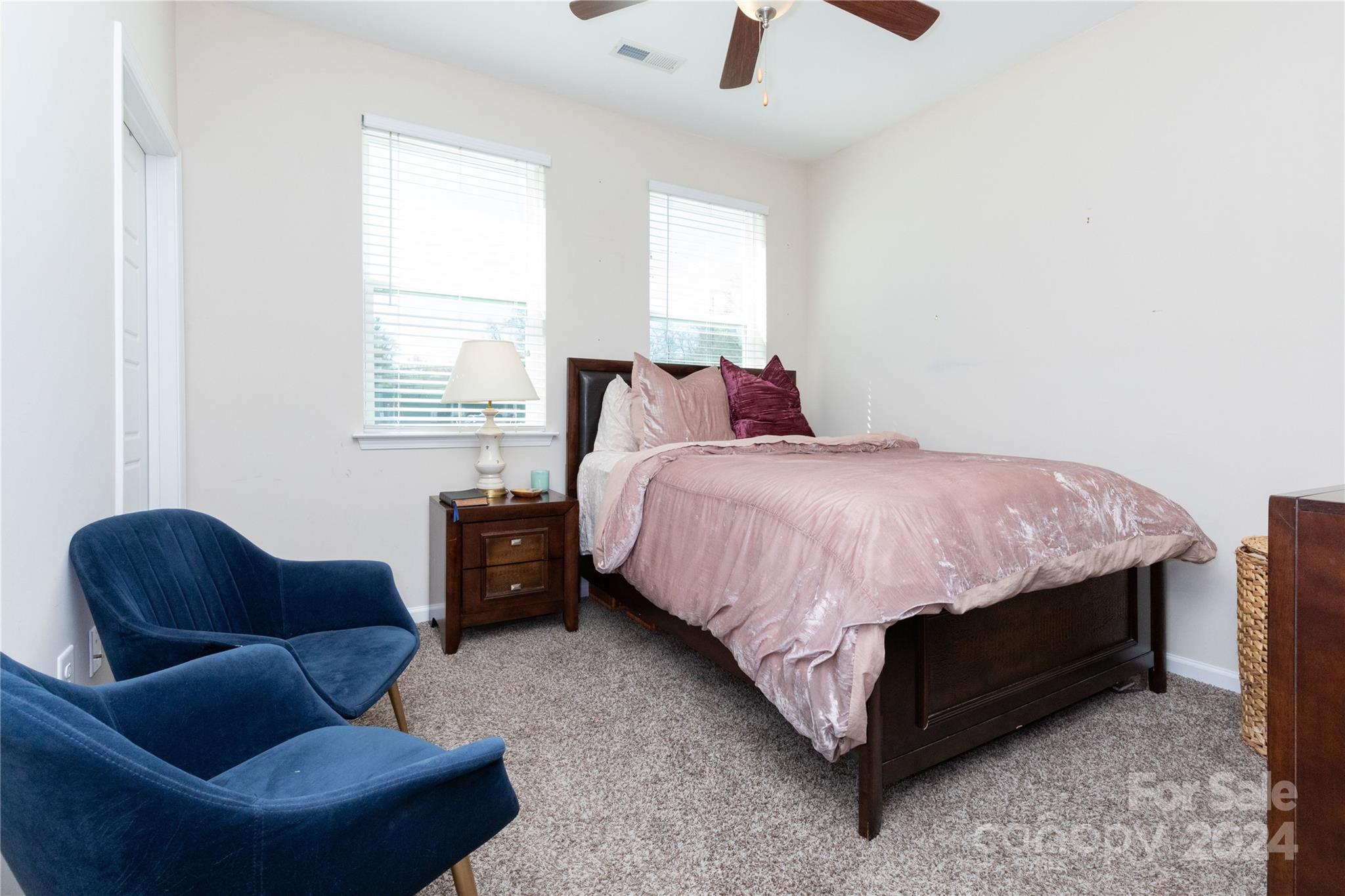 72 Shiloh Road Asheville, NC 28803 - Photo 9 of 15 a bed room with a bed and a couch