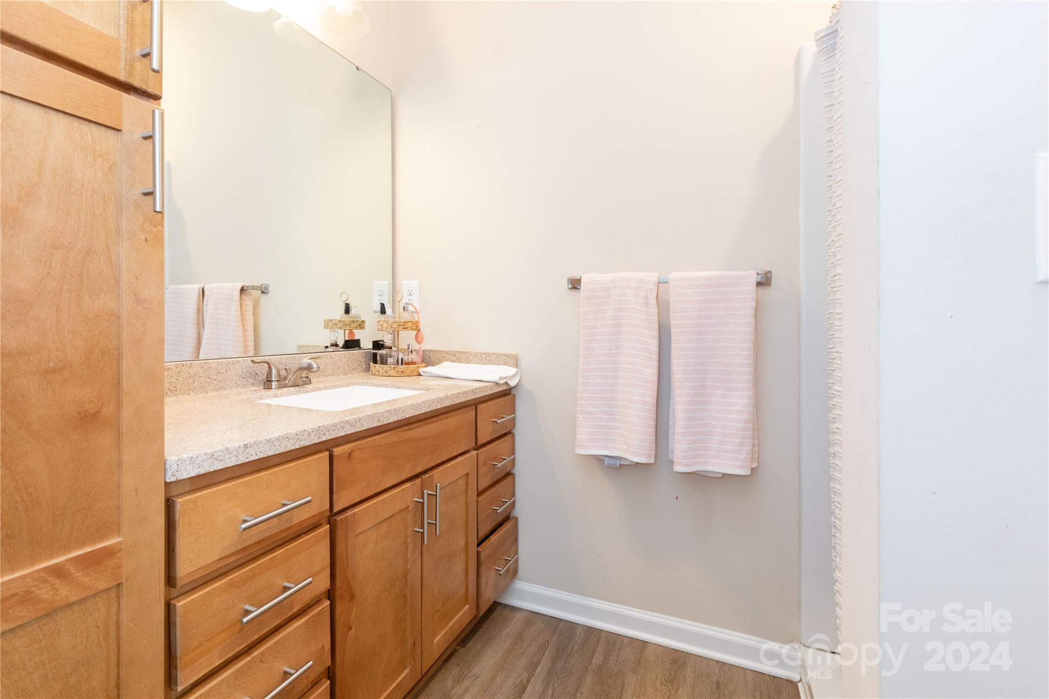 72 Shiloh Road Asheville, NC 28803 - Photo 10 of 15 a bathroom with a sink and a mirror
