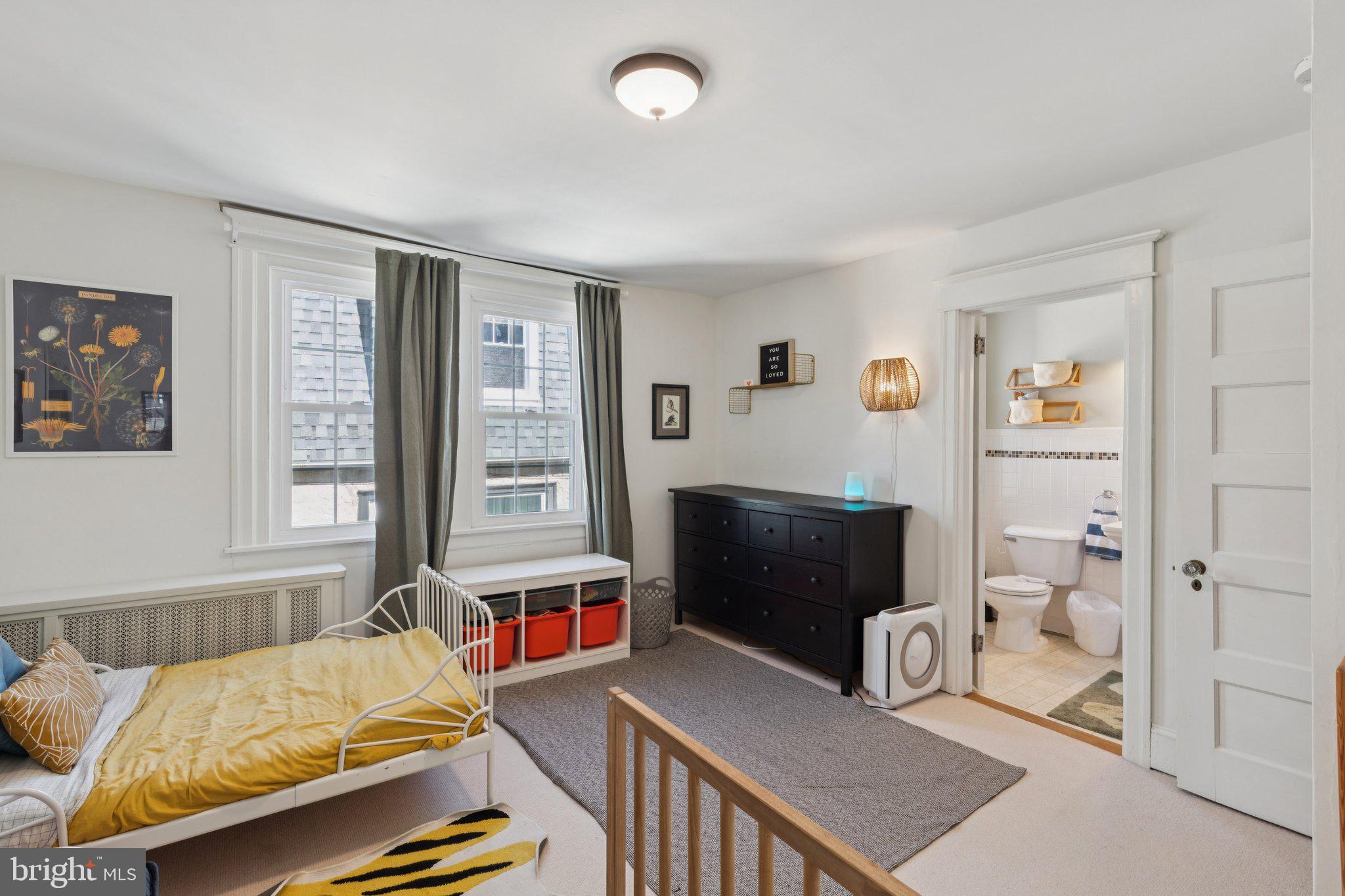 519 Burnham Road Philadelphia, PA 19119 - Photo 15 of 56 a bedroom with furniture and a window