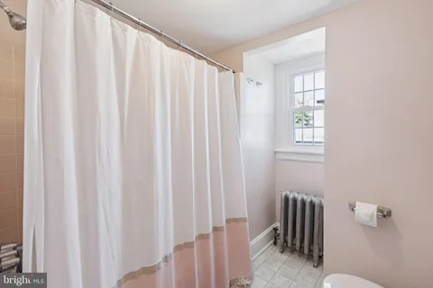 a view of a bedroom with a window