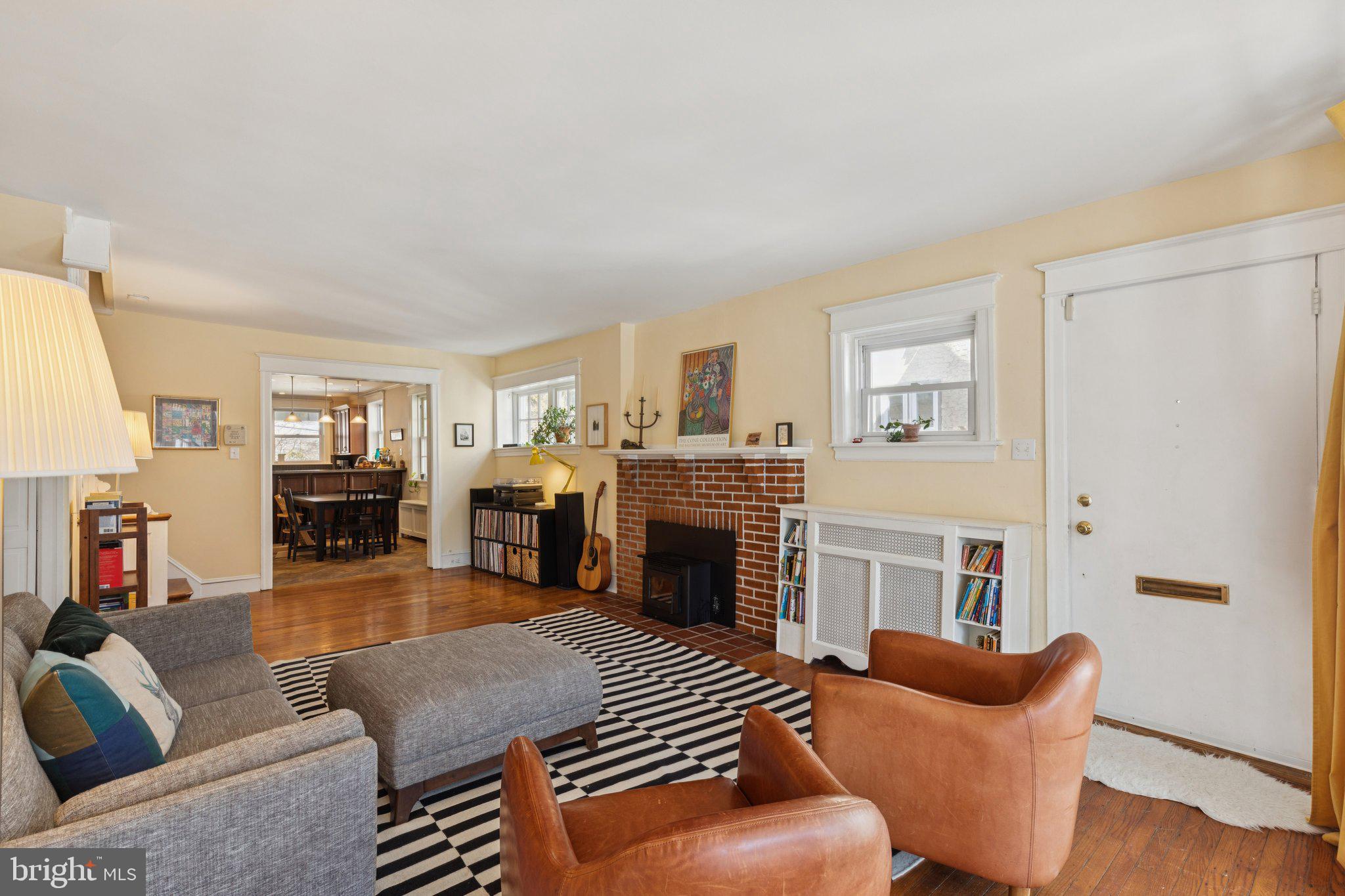 519 Burnham Road Philadelphia, PA 19119 - Photo 26 of 56 a living room with furniture and a fireplace