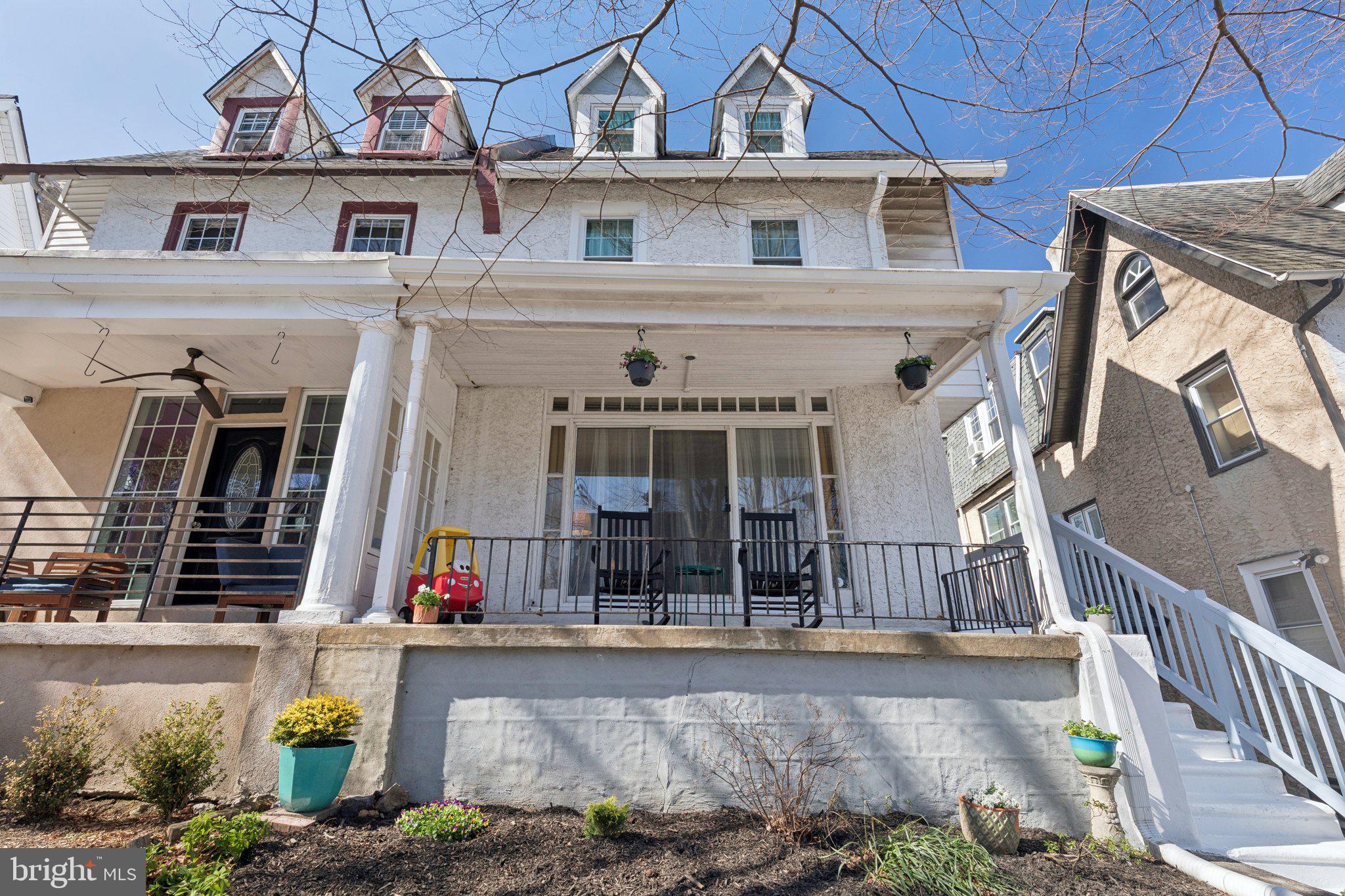 519 Burnham Road Philadelphia, PA 19119 - Photo 50 of 56 a view of a white building with large windows