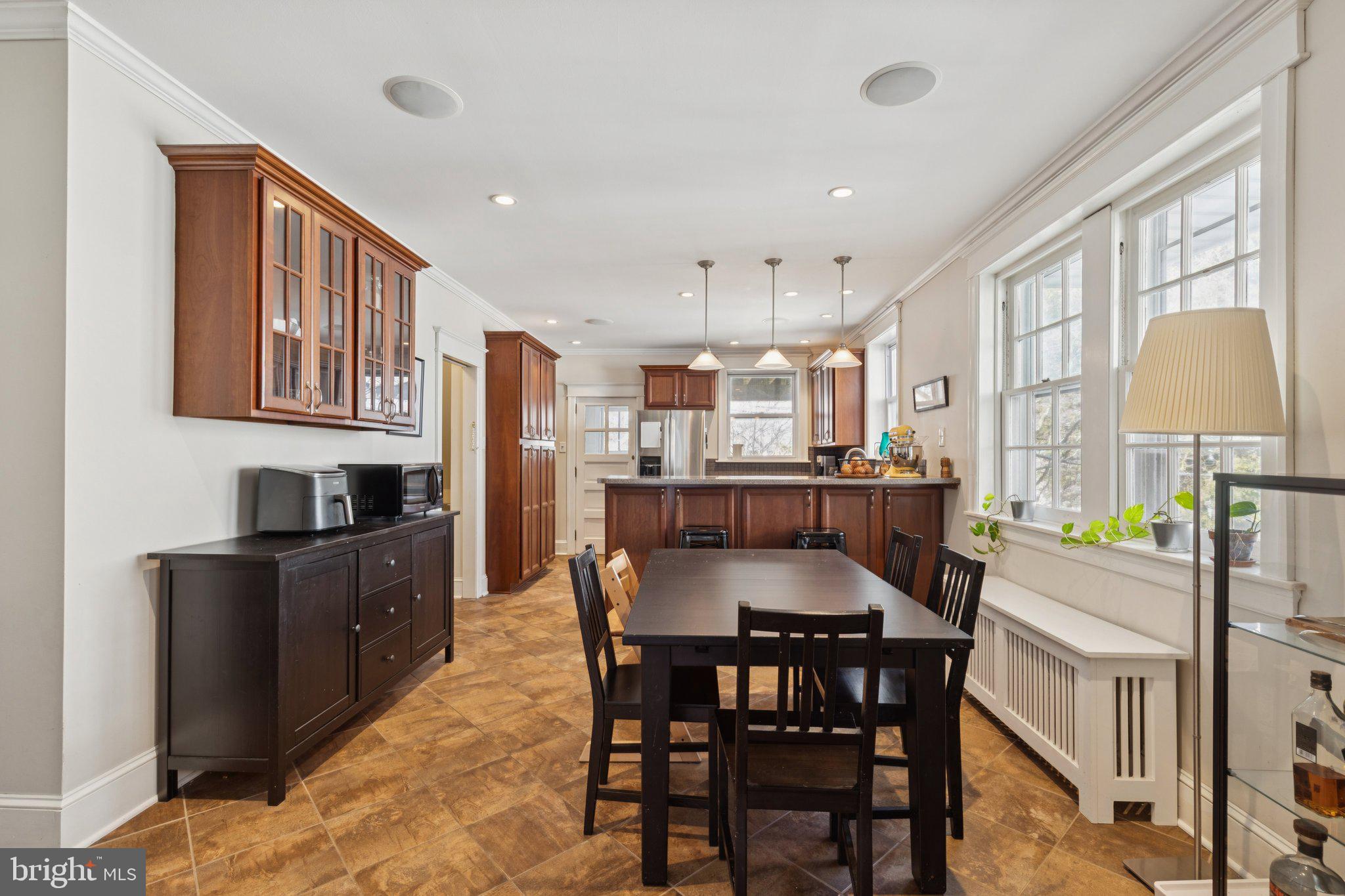 519 Burnham Road Philadelphia, PA 19119 - Photo 6 of 56 a view of a dining room with furniture window and wooden floor