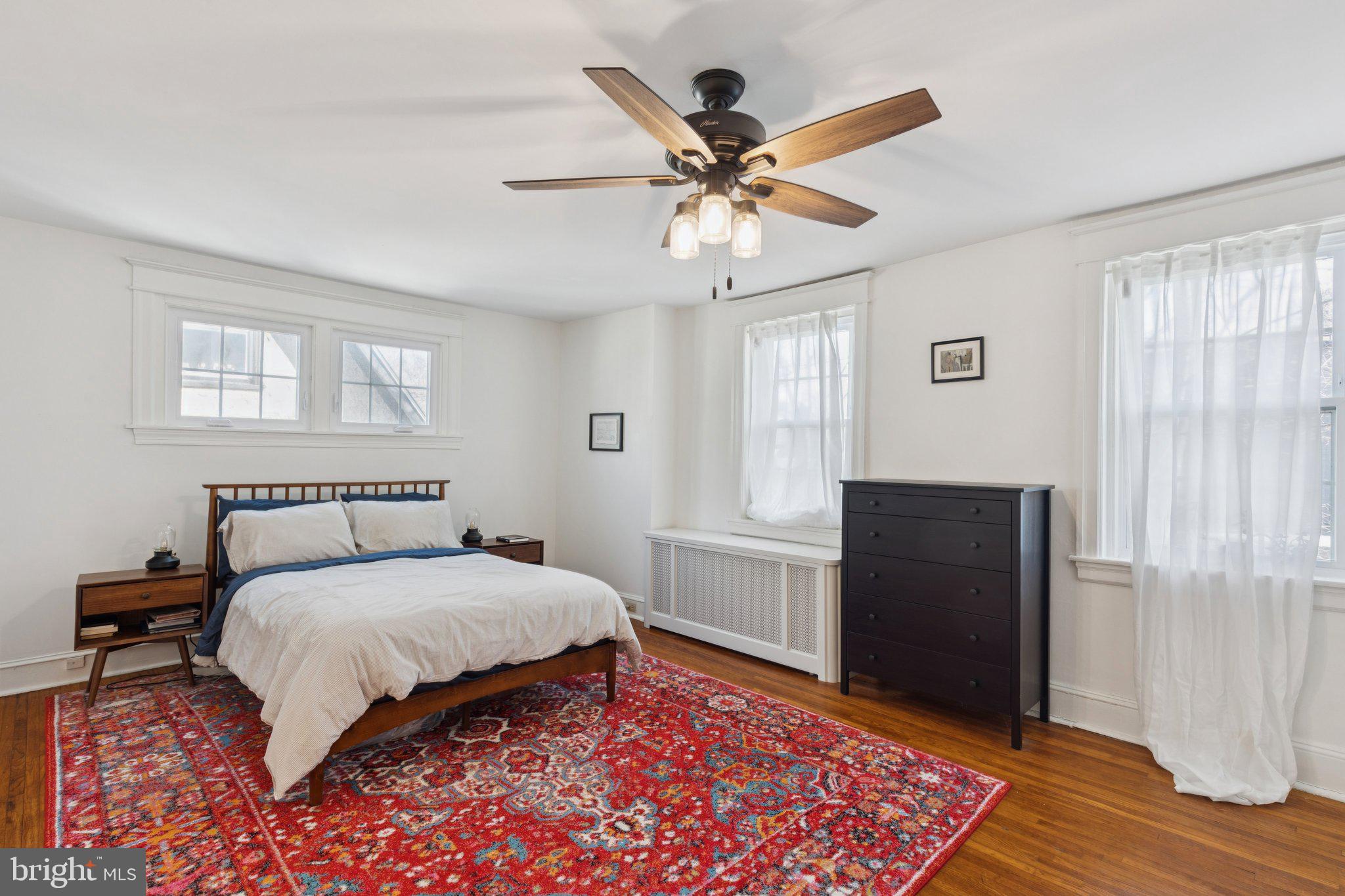 519 Burnham Road Philadelphia, PA 19119 - Photo 9 of 56 a bedroom with a bed and wooden floor