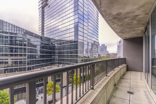 a view of balcony with a potted plant