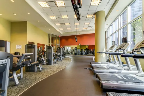 a view of a hall with furniture