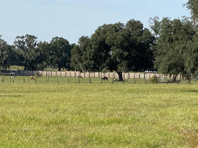 an aerial view of residential house with outdoor space