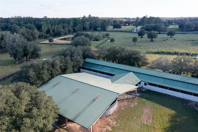 a view of house with backyard space