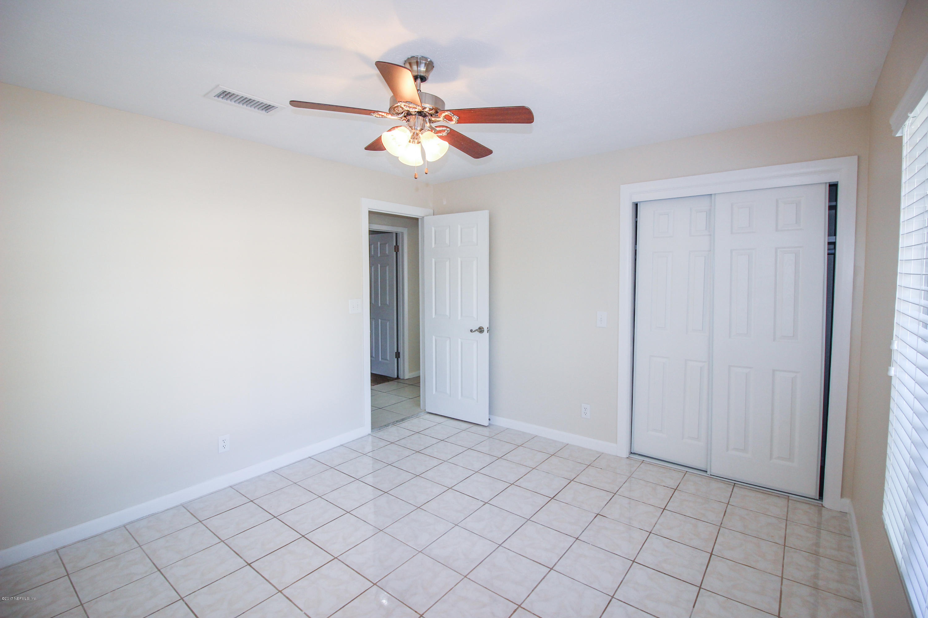 4134 Rogero Road Jacksonville, FL 32277 - Photo 23 of 36 a view of an empty room