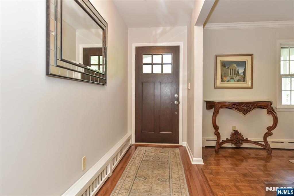 60 Dimmig Road Upper Saddle River, NJ 07458 - Photo 10 of 40 a room with window and a table
