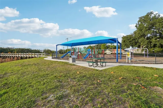 a view of a park with swings
