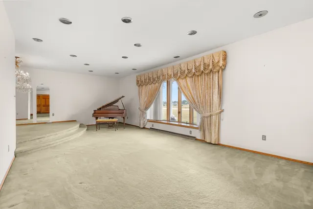 a view of a livingroom with a furniture