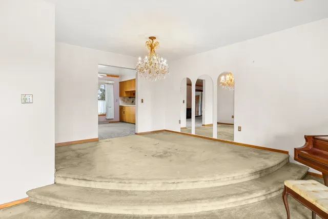 a living room with furniture and a couch