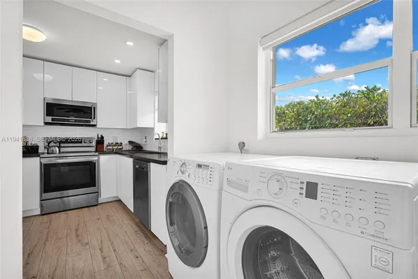 a bed room with a bed and a television