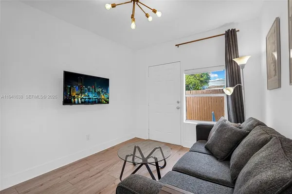 a house view with a garden space