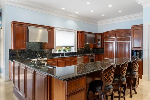 a view of a hallway with living room and dining room view
