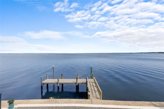 a view of swimming pool with a yard and seating area