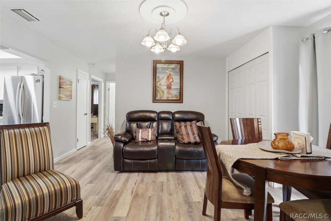 2507 Bluegrass Street Inverness, FL 34453 - Photo 11 of 43 Dining or 2nd living area with sliders for natural light