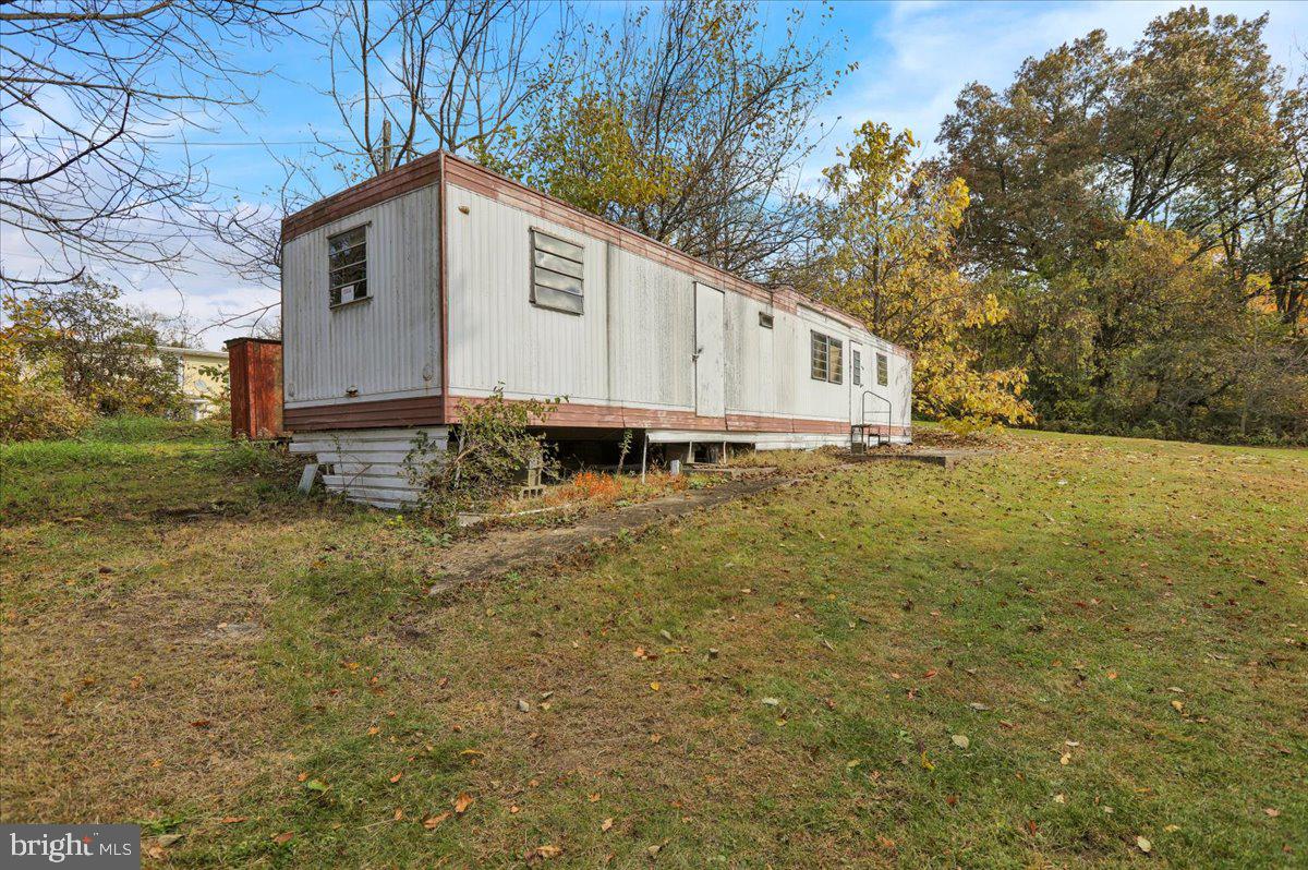 185 West Wesner Road Blandon, PA 19510 - Photo 25 of 28 a white house covered with tall trees