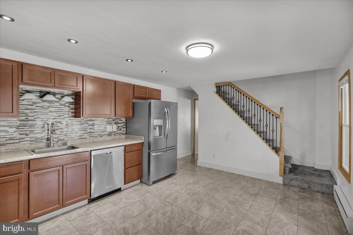 185 West Wesner Road Blandon, PA 19510 - Photo 6 of 28 a kitchen with stainless steel appliances granite countertop a stove and a refrigerator