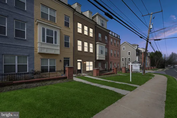 a view of a building with a yard