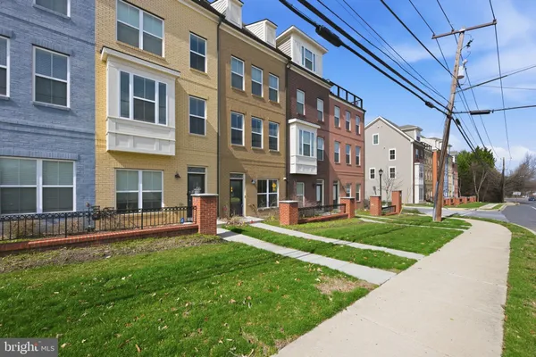 a view of a building with a yard