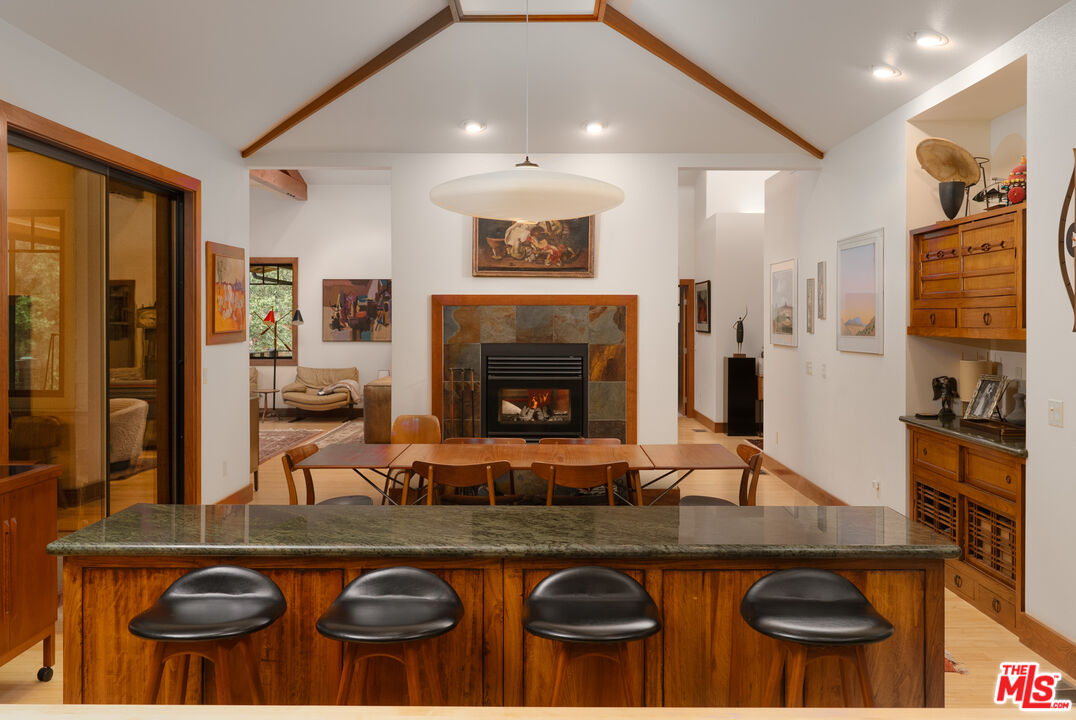 25445 Fern Valley Road Idyllwild, CA 92549 - Photo 13 of 45 a living room with furniture and a fireplace