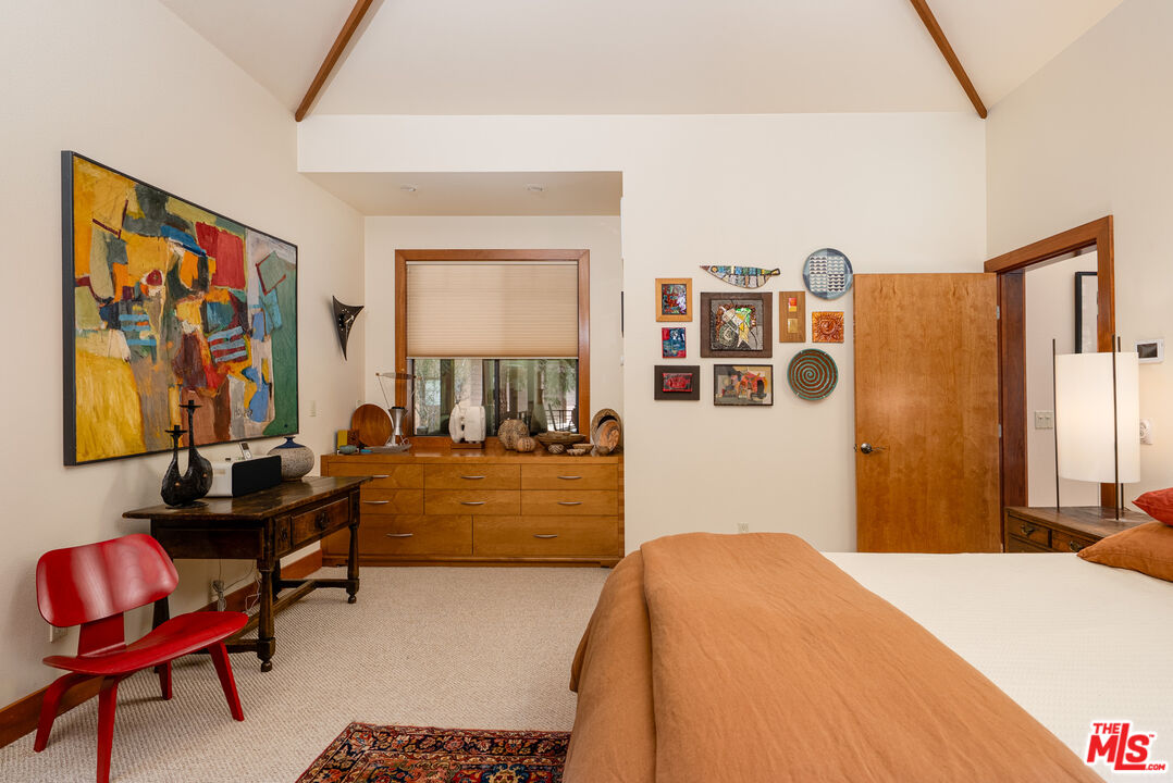 25445 Fern Valley Road Idyllwild, CA 92549 - Photo 16 of 45 a bedroom with a bed and furniture