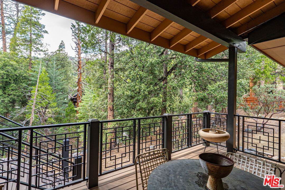 25445 Fern Valley Road Idyllwild, CA 92549 - Photo 19 of 45 a view of a balcony with chairs