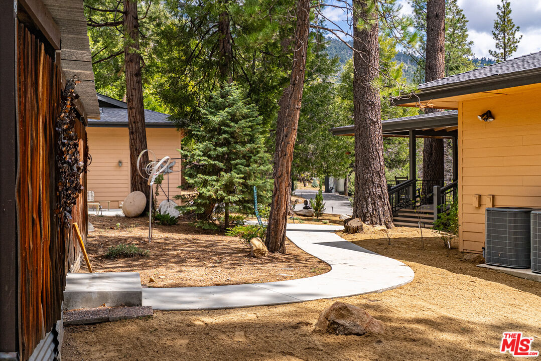 25445 Fern Valley Road Idyllwild, CA 92549 - Photo 35 of 45 a view of a living room and trees