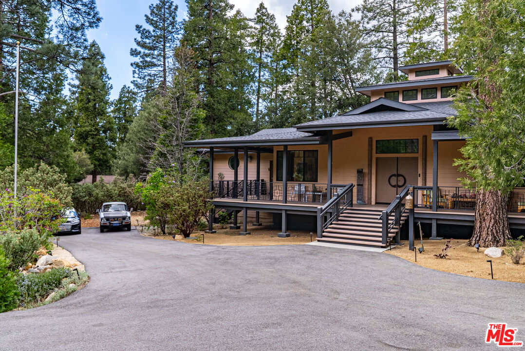25445 Fern Valley Road Idyllwild, CA 92549 - Photo 39 of 45 an outdoor view of house with outdoor seating