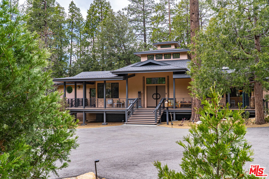 25445 Fern Valley Road Idyllwild, CA 92549 - Photo 42 of 45 a front view of a house with garden