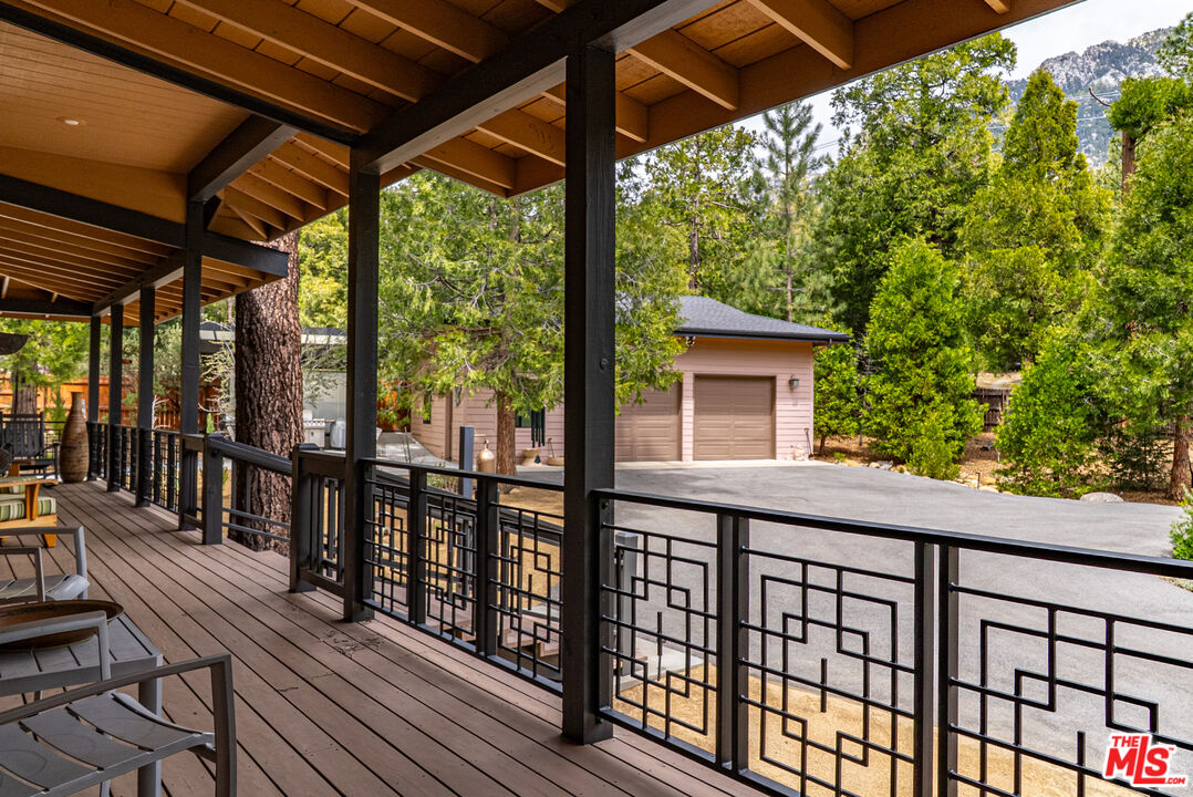 25445 Fern Valley Road Idyllwild, CA 92549 - Photo 5 of 45 a view of a balcony with wooden floor