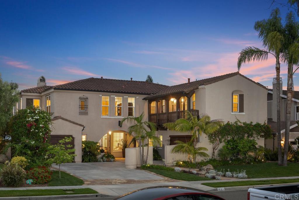 7603 Circulo Sequoia Carlsbad, CA 92009 - Photo 1 of 61 a front view of a house with a yard