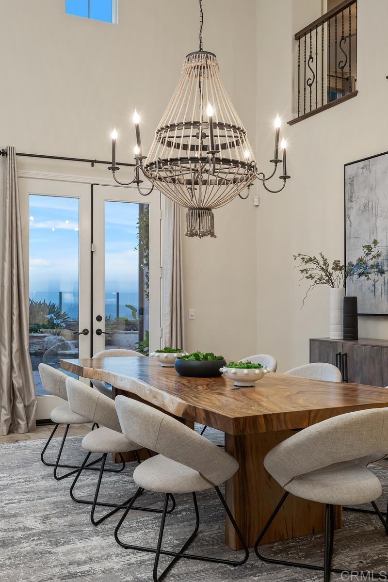 7603 Circulo Sequoia Carlsbad, CA 92009 - Photo 11 of 61 a view of a dining room with furniture window and wooden floor