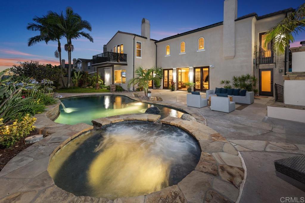 7603 Circulo Sequoia Carlsbad, CA 92009 - Photo 2 of 61 a view of a swimming pool with a patio