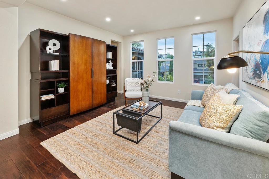 7603 Circulo Sequoia Carlsbad, CA 92009 - Photo 33 of 61 a living room with furniture and a window