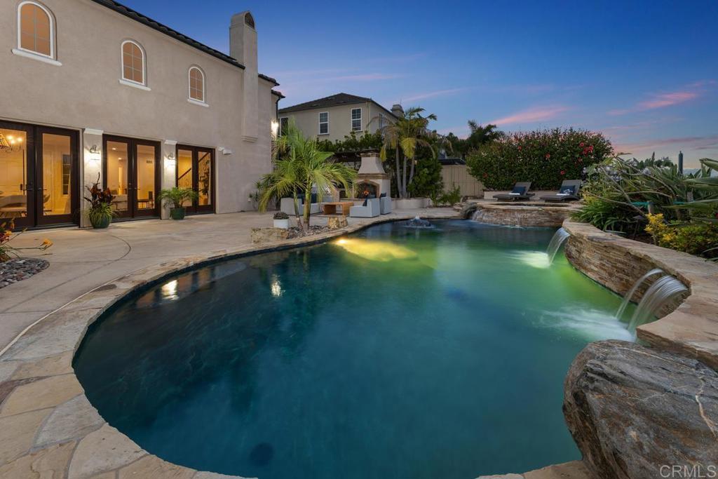 7603 Circulo Sequoia Carlsbad, CA 92009 - Photo 42 of 61 a view of a swimming pool with lounge chair