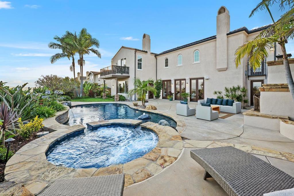 7603 Circulo Sequoia Carlsbad, CA 92009 - Photo 46 of 61 a view of a house with backyard and sitting area