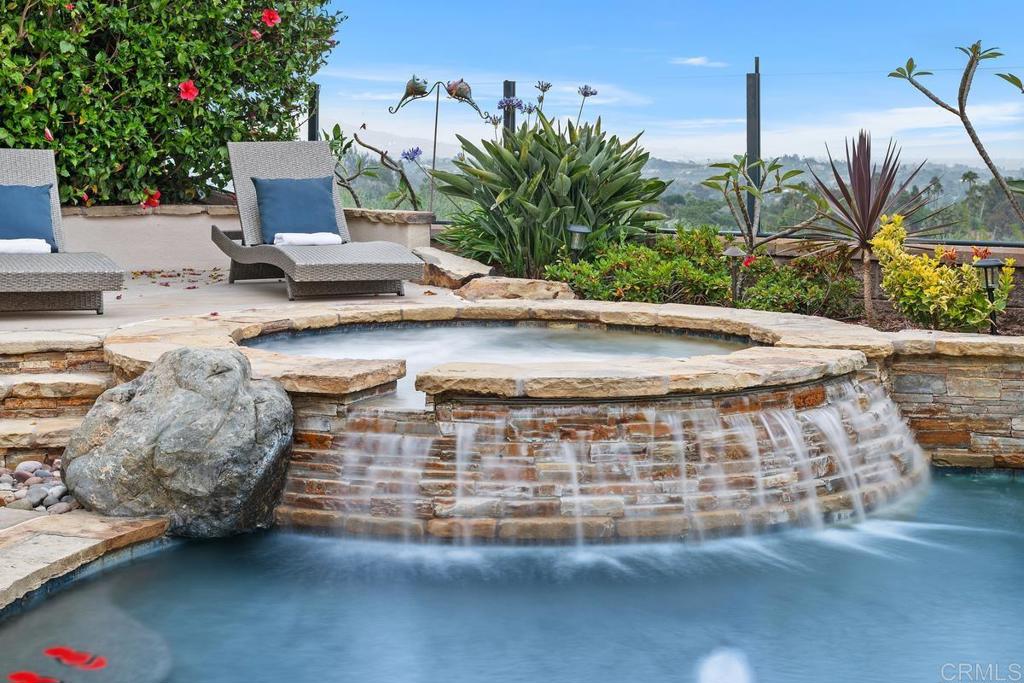 7603 Circulo Sequoia Carlsbad, CA 92009 - Photo 47 of 61 a view of a street with cars