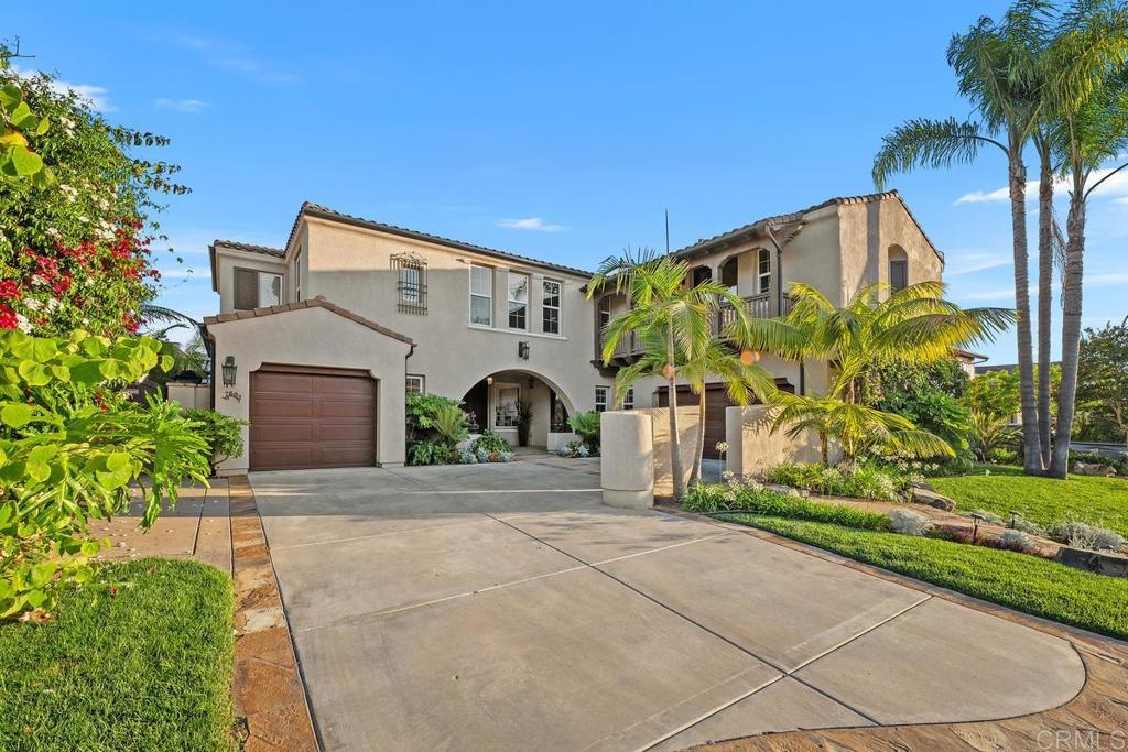 7603 Circulo Sequoia Carlsbad, CA 92009 - Photo 51 of 61 a front view of a house with garden
