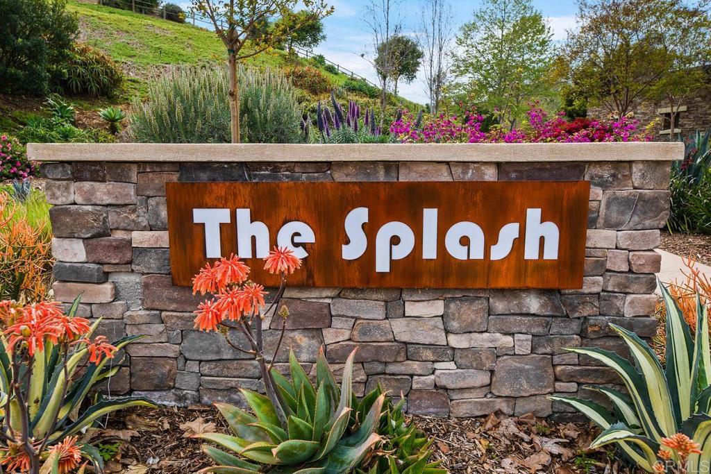 7603 Circulo Sequoia Carlsbad, CA 92009 - Photo 59 of 61 a street sign that is on a brick wall
