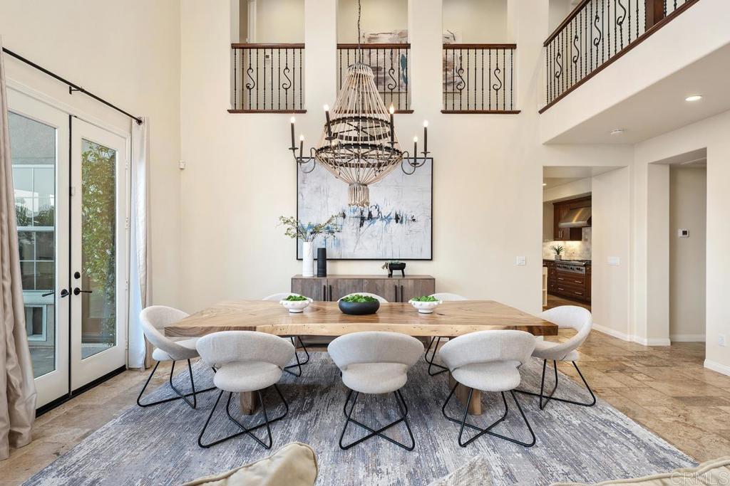 7603 Circulo Sequoia Carlsbad, CA 92009 - Photo 10 of 61 a dining room with furniture and wooden floor