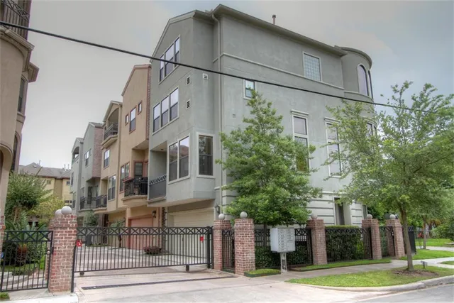 a view of a street with a building on the street
