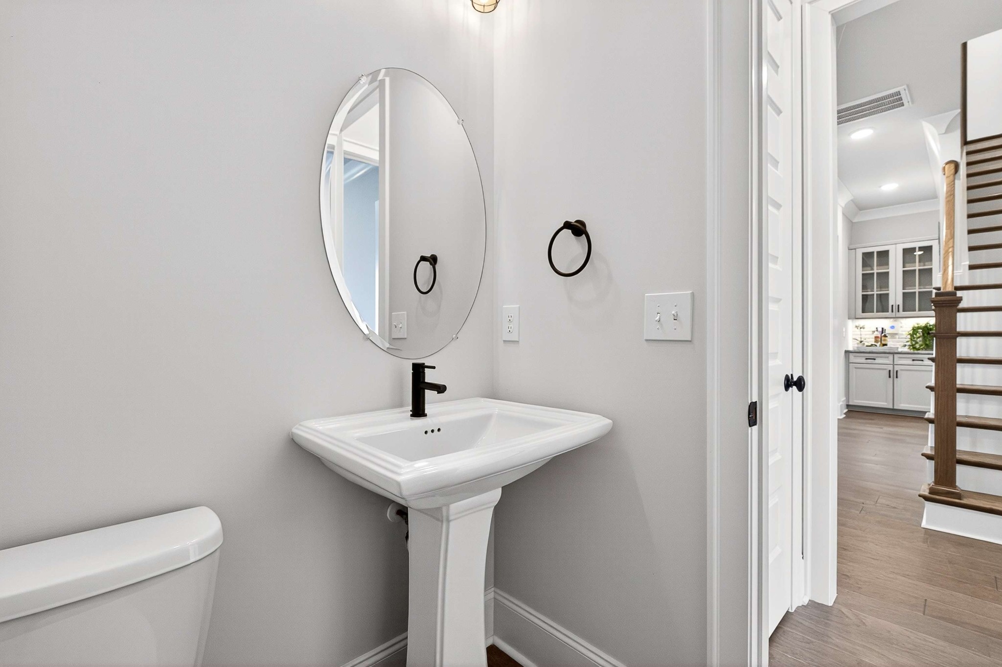 3544 Barnsley Lane Franklin, TN 37067 - Photo 31 of 77 a bathroom with a sink toilet and mirror