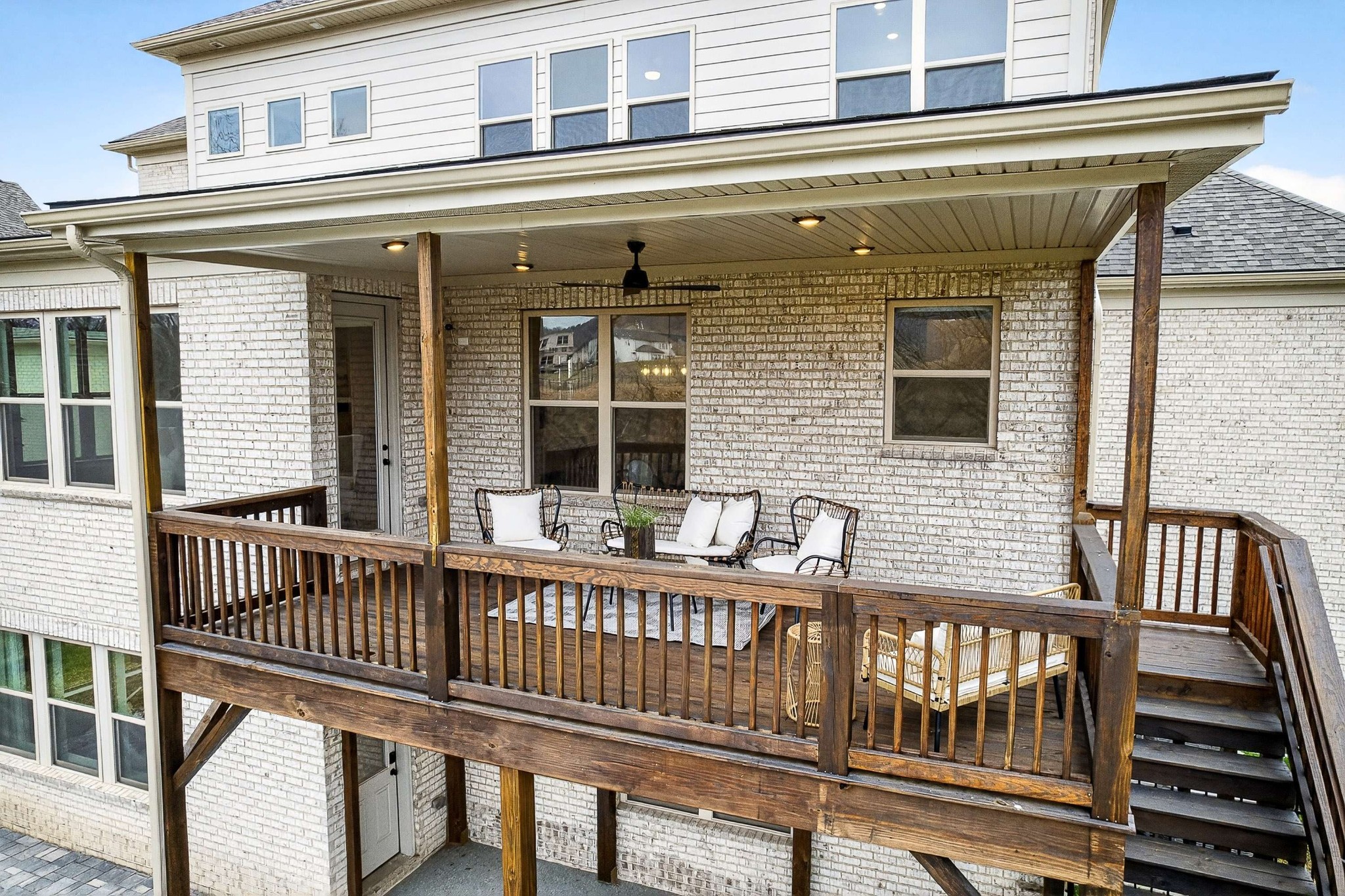 3544 Barnsley Lane Franklin, TN 37067 - Photo 70 of 77 a view of a brick house with a deck
