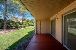 130 Castle Rock Road, Unit 46 Sedona, AZ 86351 - Photo 16 of 19 REAR PATIO WITH STORAGE CLOSET